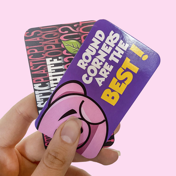 hand holding business card with round corners